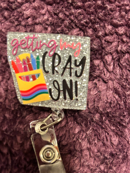 Crayon badge reel